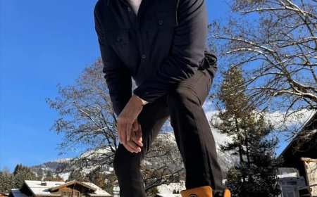 DEV RETURNS TO ACTION WORLD