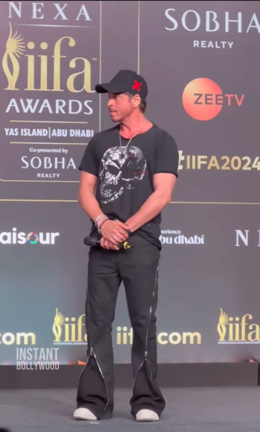 Shah Rukh Khan Unveils New Look at IIFA 2024 Press Conference, Set to Co-Host with Karan Johar